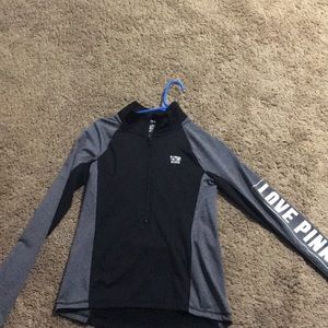 tight fitting pink sweatshirt